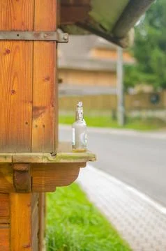 Empty beer bottles left by the road Stock Photos