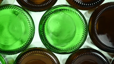 Empty beer bottles lie on top of each other Stock Footage 124547816