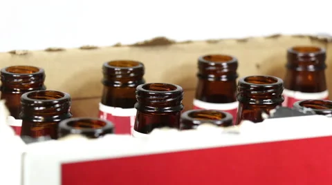 Empty beer bottles rotating on white background Video stock 40465942