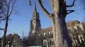 Empty bench on beautiful square near ancient Bern Minster cathedral, sunny day 4k or 4k+ Resolution