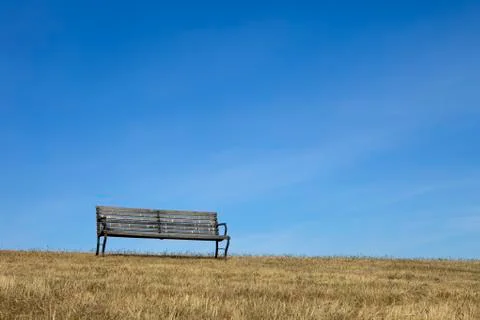 Empty bench with blue sky Stock Photos