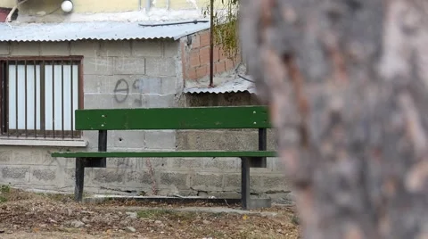An Empty Bench in a City Park Stock Footage 69024924