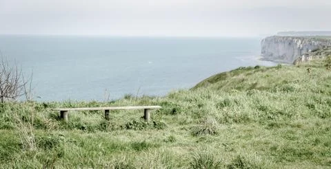 Empty bench at Etretat Stock Photos