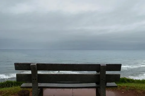 Empty bench front the sea, back view Stock Photos