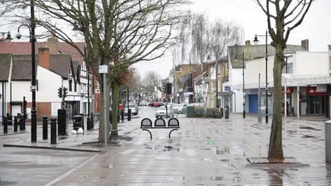 Empty bench on a high street in England Stock Footage 87933549