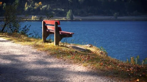 Empty Bench by Lake as Solitude and Reflection Concept Stock Footage 336660083
