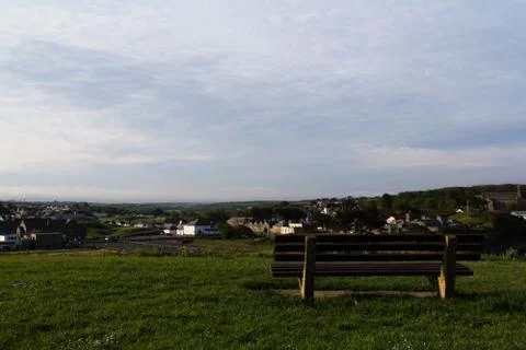Empty bench over looking the countryside from Bude, Cornwall Stock Photos