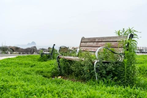 Empty bench with sea background Stock Photos