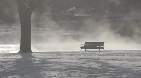 Empty bench by steaming river Stock Footage 33896297