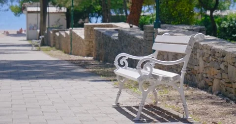 Empty benches on the promenade towards the beach in Biograd na moru. Stock Footage 133086800