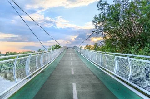 Empty bicycle bridge (called Freedom bridge) connecting two countries Slovaki Stock Photos