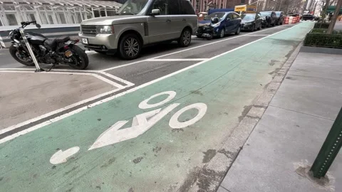 Empty bicycle lane on New York City street in NYC Stock Footage