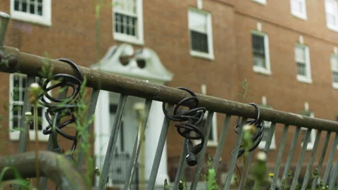 An empty bicycle rack on a college campus Stock Footage 130733611