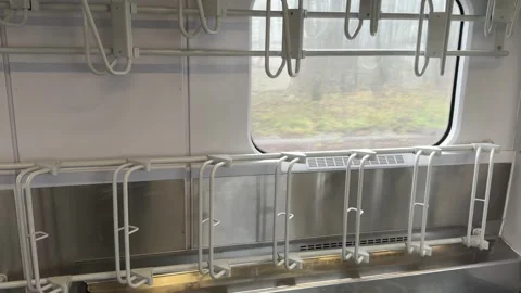Empty bicycle rack inside a modern public transport train, clearly marked w.. 스톡 동영상 333616965