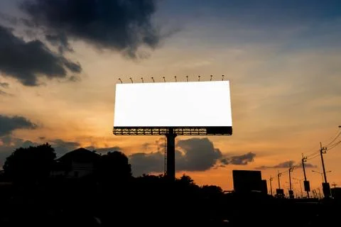 Empty big billboard in sunset Stock Photos
