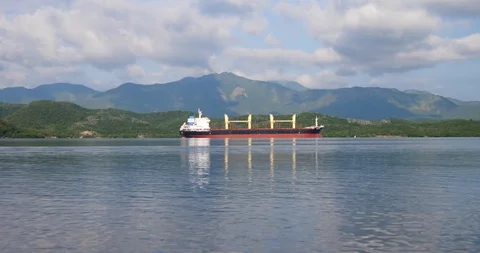 Empty big cargo boat in beautiful landscape Stock Footage 118819810
