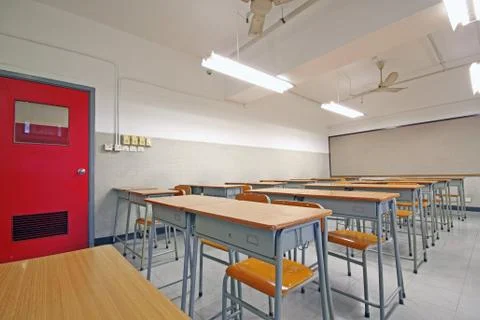 Empty big classroom at school Stock Photos