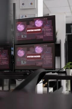 Empty big data agency having multiple computers showing hacking alert 스톡 사진