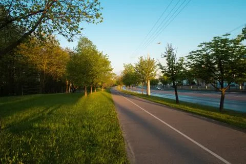 Empty bike path route infrastructure early in the spring sunny morning. No pe Stock Photos
