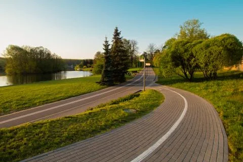 Empty bike path route infrastructure early in the spring sunny morning. No pe Stock Photos
