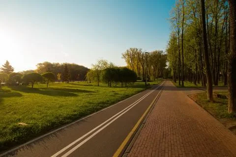 Empty bike path route infrastructure early in the spring sunny morning. No Stock Photos