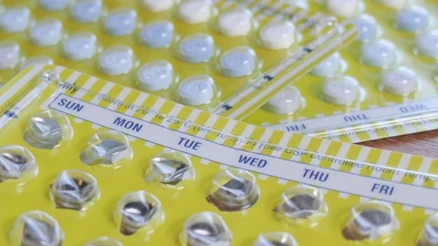 Empty Bill Control Pack on Full Packages of Oral Contraceptive pills in 4k Stock Footage 86451746