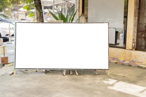 Empty billboard for advertising. Display board stands in front of the entra.. Stock Photos