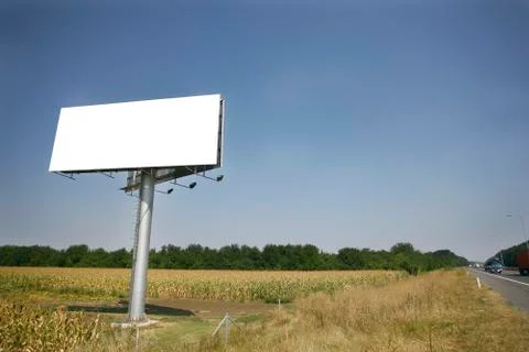 Empty billboard on background of sunset sky Stock-Fotos