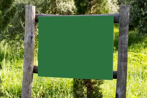 Empty billboard in the forest Stock Photos