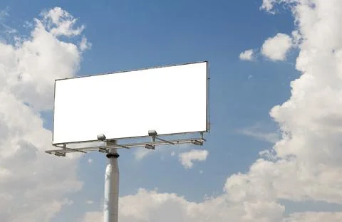 Empty billboard in front of beautiful cloudy sky in a rural location 스톡 사진