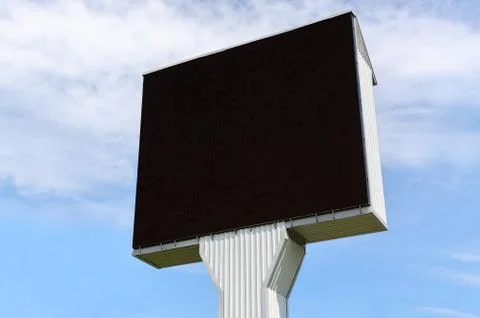 Empty billboard on the sky background Stock Photos