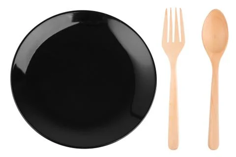Empty black caramic celadon dish and spoon fork Stock Photos