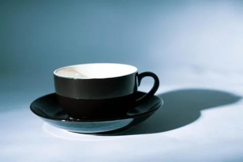Empty black cup Stock Photos
