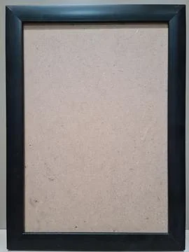 Empty black photo frame on clean background. Stock Photos