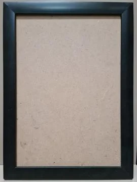 Empty black photo frame on clean background. Stock Photos