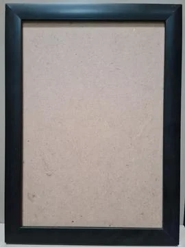 Empty black photo frame on clean background. Stock Photos