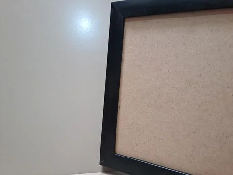 Empty black photo frame on clean background. Stock Photos