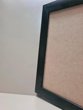 Empty black photo frame on clean background. Stock Photos