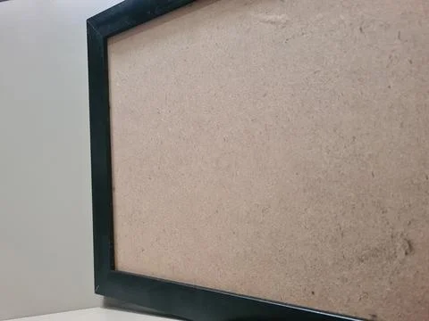 Empty black photo frame on clean background. Stock Photos