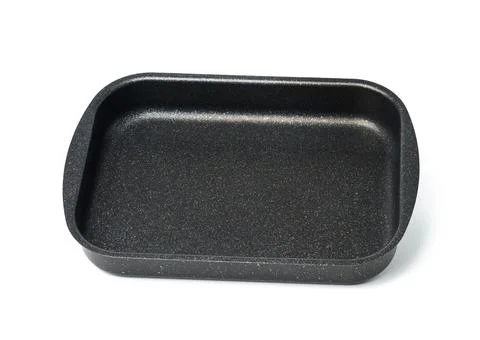 Empty black rectangular non-stick oven tray isolated on white background, top Foto stock