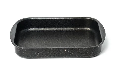 Empty black rectangular non-stick oven tray isolated on white background, top Foto stock