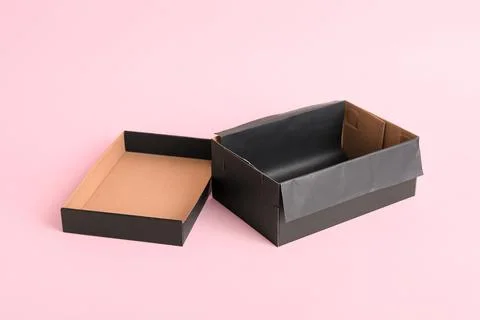 Empty black shoebox on pink background Stock Photos