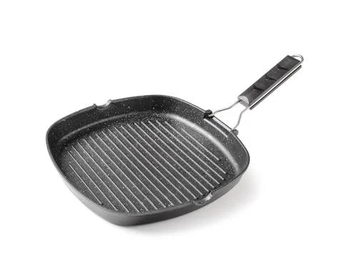 Empty black square grill pan with a non-stick surface and ribbed bottom kitch Stock Photos