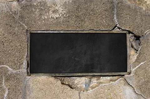 Empty Blackboard with Metal Rectangular Frame on a Concrete Wall Stock Photos