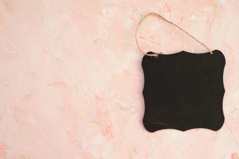 Empty blackboard on a pink background Stock Photos