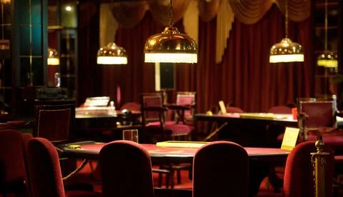 An empty blackjack table in a casino in red tones Foto stock
