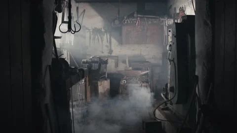 Empty blacksmith's workshop filling up with smoke Stock Footage 131750839