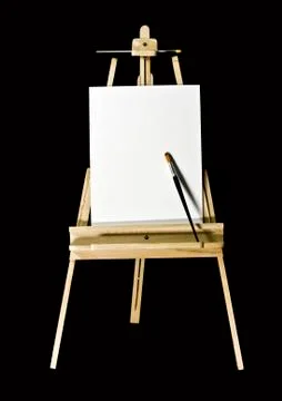 Empty blank canvas in dark room on the wooden easel Stock Photos