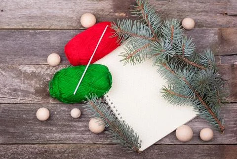 Empty blank notepad with a pattern polka dot, yarn, hook, wooden beads and .. Stock Photos