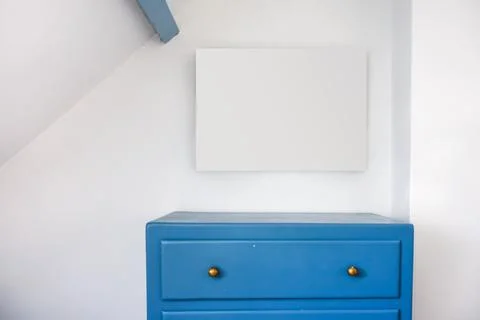 Empty blank picture frame in a rustic room Stock Photos